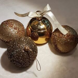 Sparkly Elegant Classy Gold and Brown Ornaments with a Gold Candle